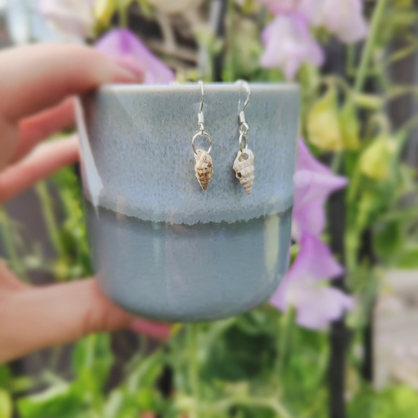 Spiral shell dangle earrings deals