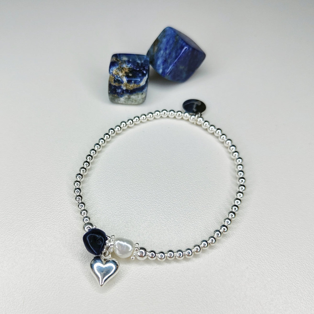 An example Create Your Own bracelet with several gemstones